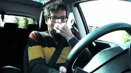 man-driving-car-sneezing.jpg